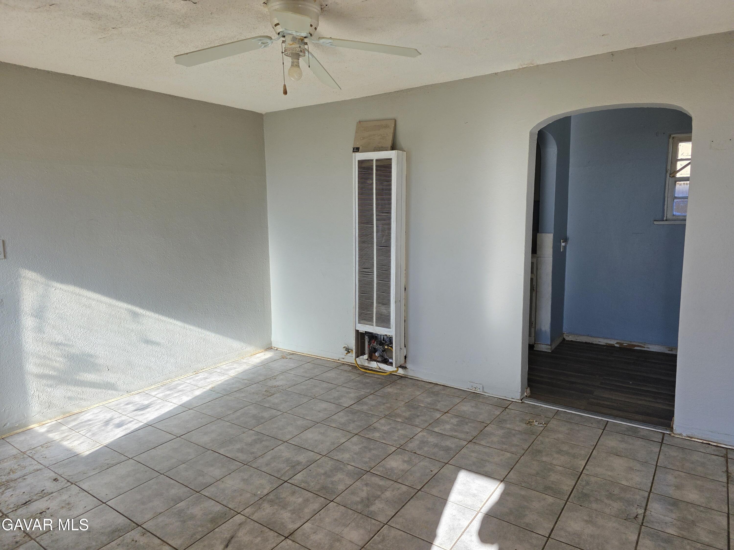 16133 I Street Mojave, CA 93501 - Photo 26 of 30 an empty room with fan