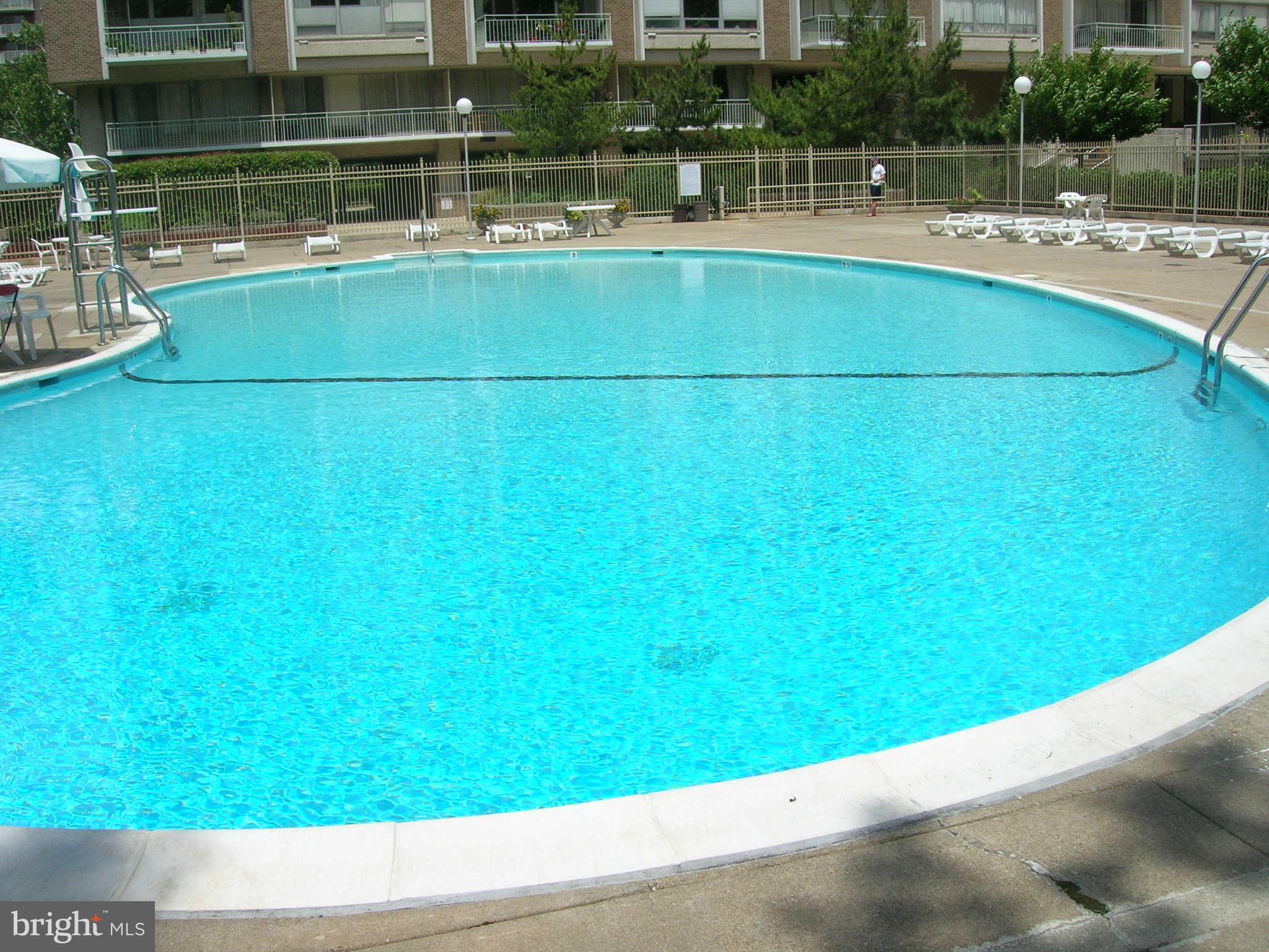 1435 4th Street Southwest, Unit B201 Washington, DC 20024 - Photo 15 of 22 a view of a swimming pool with an outdoor space and seating area