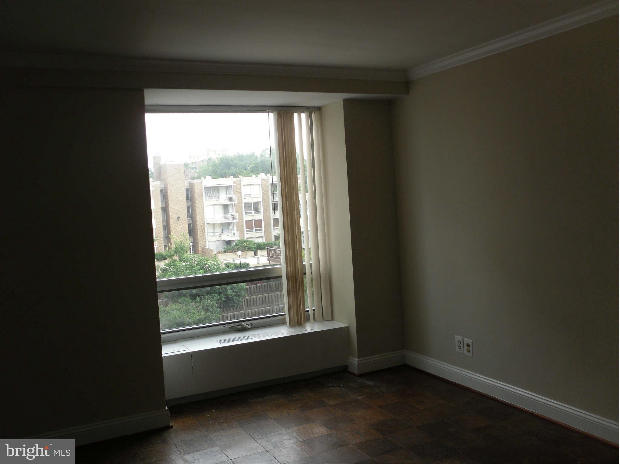 1435 4th Street Southwest, Unit B201 Washington, DC 20024 - Photo 6 of 22 a view of an empty room with a window