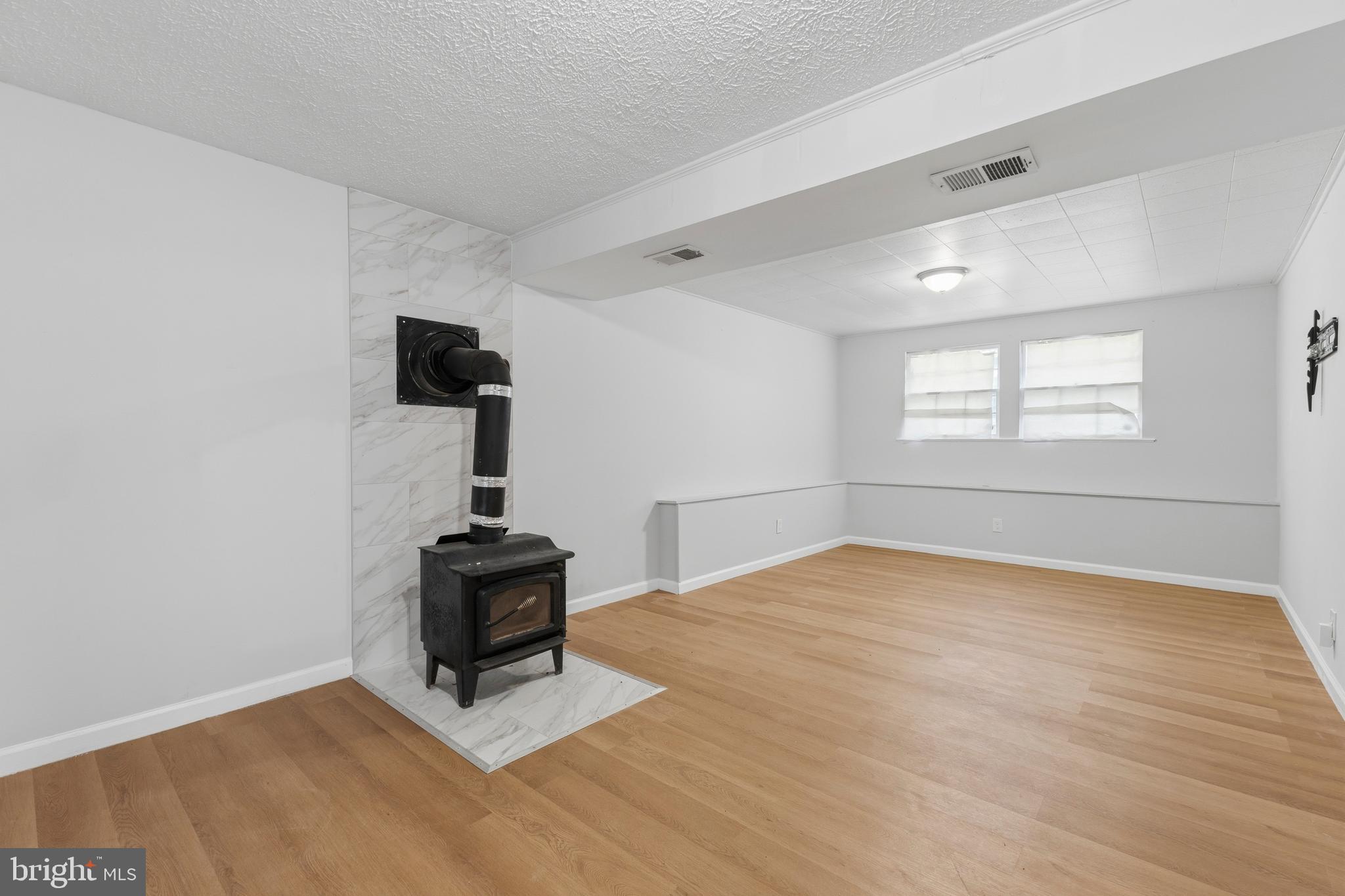 119 Jefferson Road Waldorf, MD 20602 - Photo 24 of 40 a view of a livingroom with wooden floor and a window