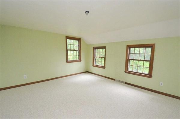 642 Wheeler Road Dracut, MA 01826 - Photo 21 of 30 an empty room with windows