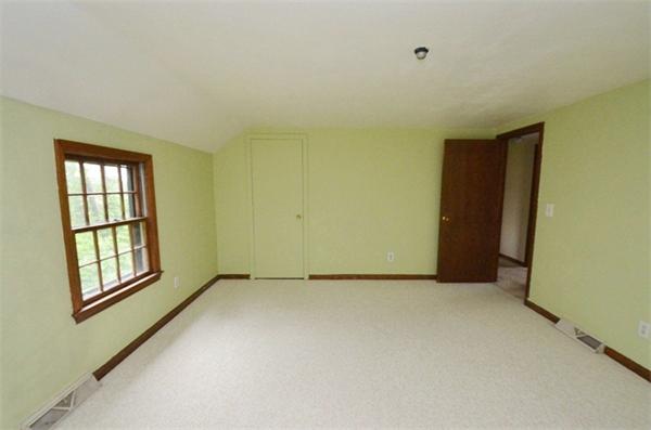 642 Wheeler Road Dracut, MA 01826 - Photo 22 of 30 an empty room with windows