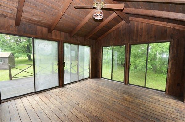 642 Wheeler Road Dracut, MA 01826 - Photo 24 of 30 a view of a room with wooden floor and outdoor space