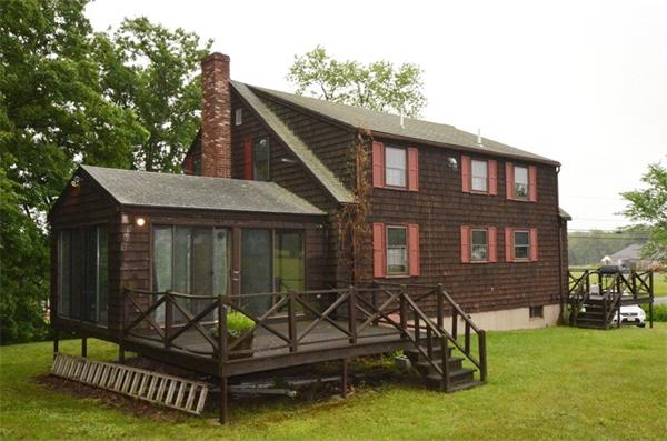 642 Wheeler Road Dracut, MA 01826 - Photo 28 of 30 a view of a house with backyard
