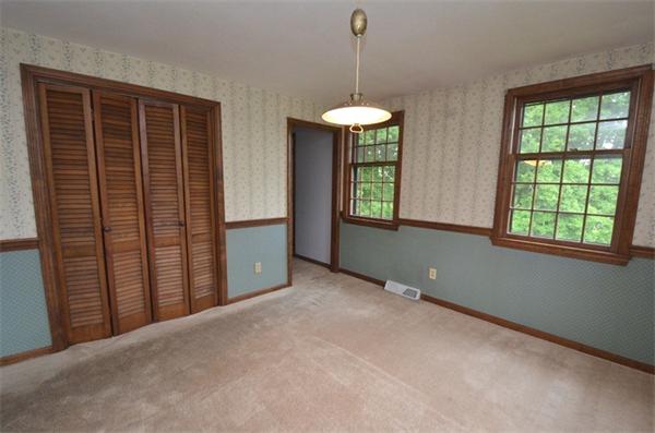 642 Wheeler Road Dracut, MA 01826 - Photo 5 of 30 a view of an empty room with a window