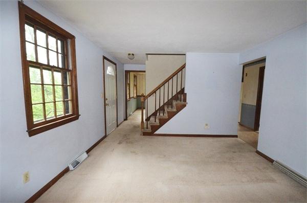 642 Wheeler Road Dracut, MA 01826 - Photo 9 of 30 a view of an empty room with a window