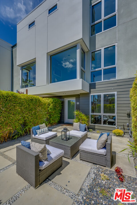 310 Washington Boulevard, Unit 802 Marina del Rey, CA 90292 - Photo 1 of 43 a outdoor living space with furniture and garden view