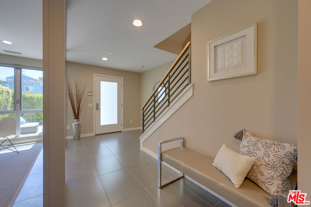 310 Washington Boulevard, Unit 802 Marina del Rey, CA 90292 - Photo 26 of 43 a view of livingroom and dining room with furniture wooden floor and windows