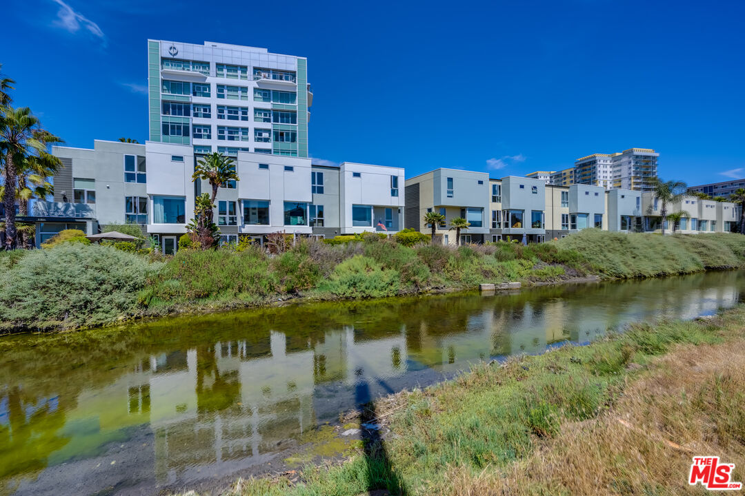310 Washington Boulevard, Unit 802 Marina del Rey, CA 90292 - Photo 35 of 43 a view of a lake with building and outdoor space