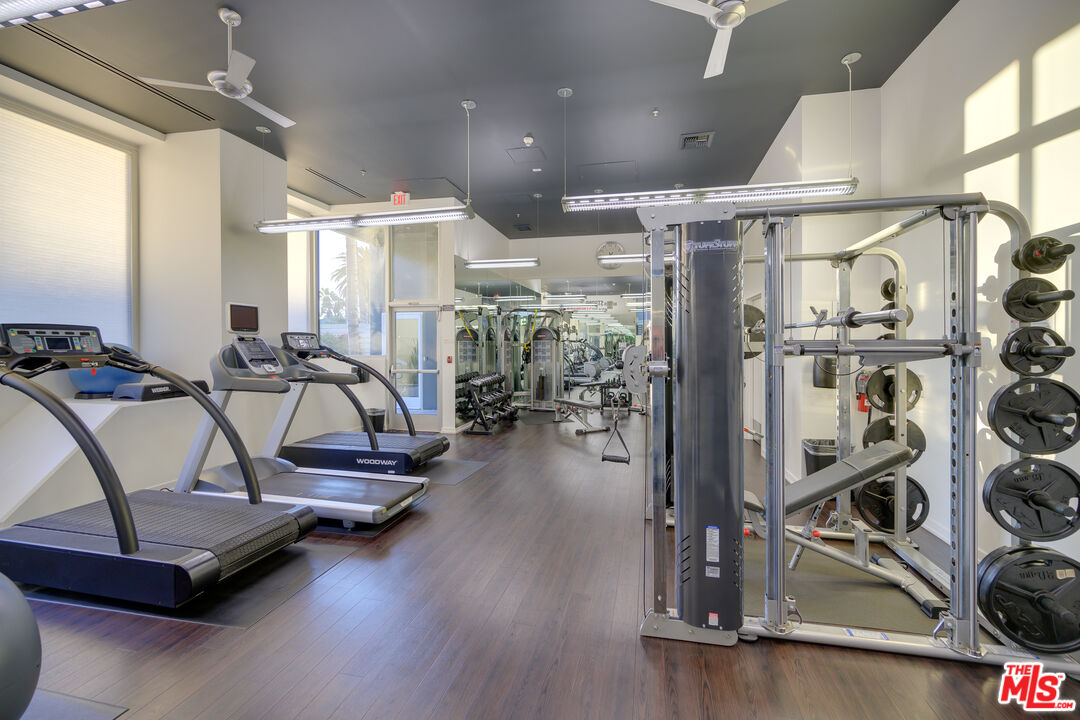 310 Washington Boulevard, Unit 802 Marina del Rey, CA 90292 - Photo 37 of 43 a view of a room with gym equipment