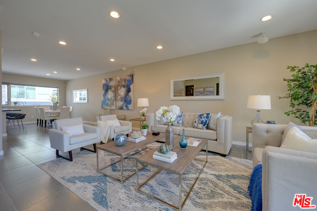 310 Washington Boulevard, Unit 802 Marina del Rey, CA 90292 - Photo 5 of 43 a living room with furniture and wooden floor
