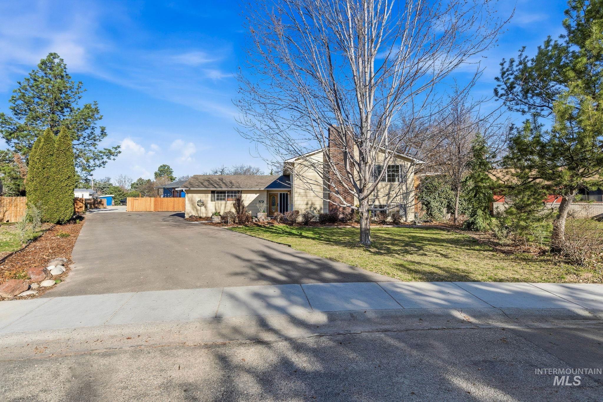 2072 South Crystal Way Boise, ID 83706 - Photo 2 of 50 View of front of house with driveway