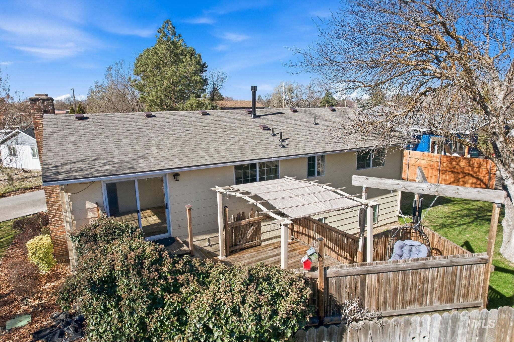 2072 South Crystal Way Boise, ID 83706 - Photo 45 of 50 Back of property with roof with shingles