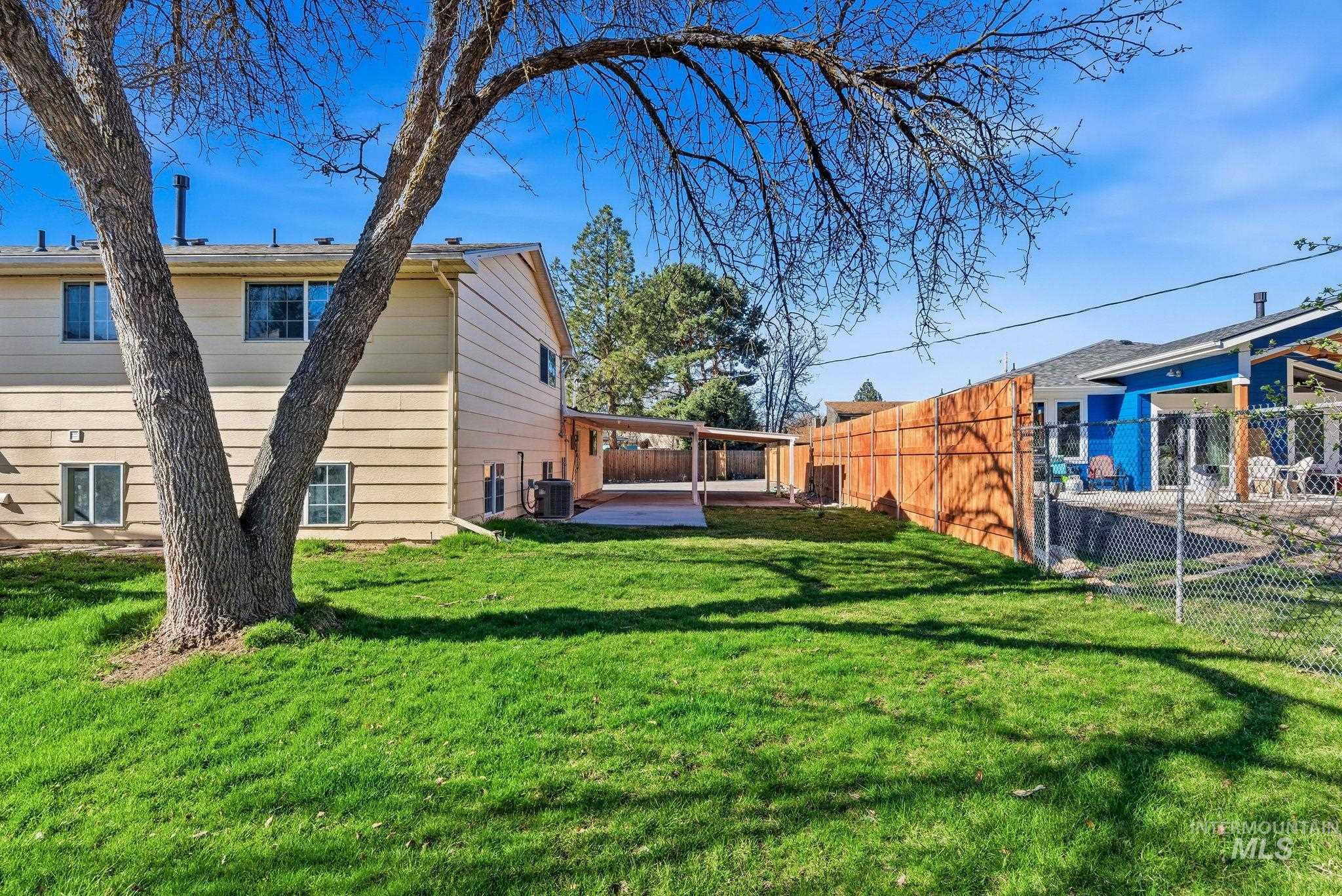 2072 South Crystal Way Boise, ID 83706 - Photo 49 of 50 View of side of property featuring a patio and a fenced backyard