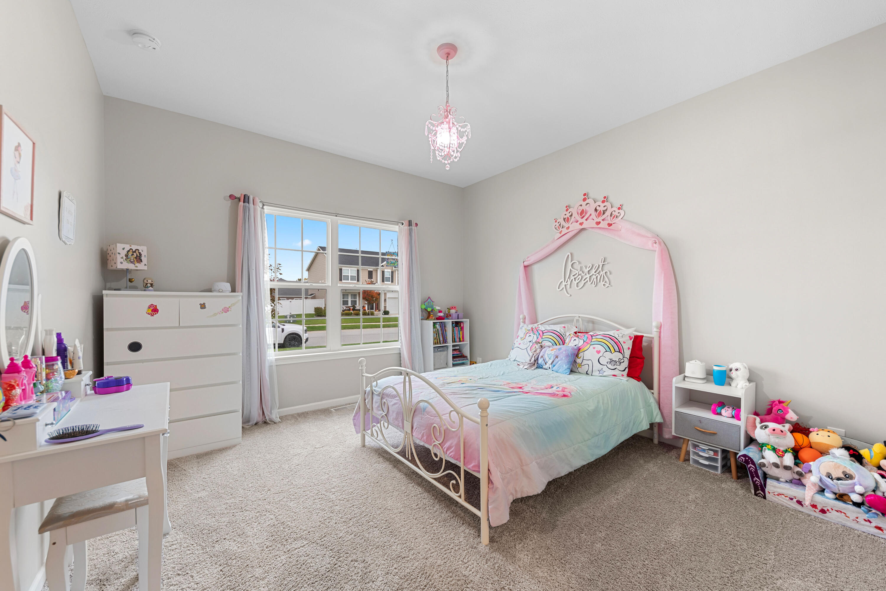 2451 Ritter Street Chesterton, IN 46304 - Photo 7 of 18 a bedroom with a bed and a window