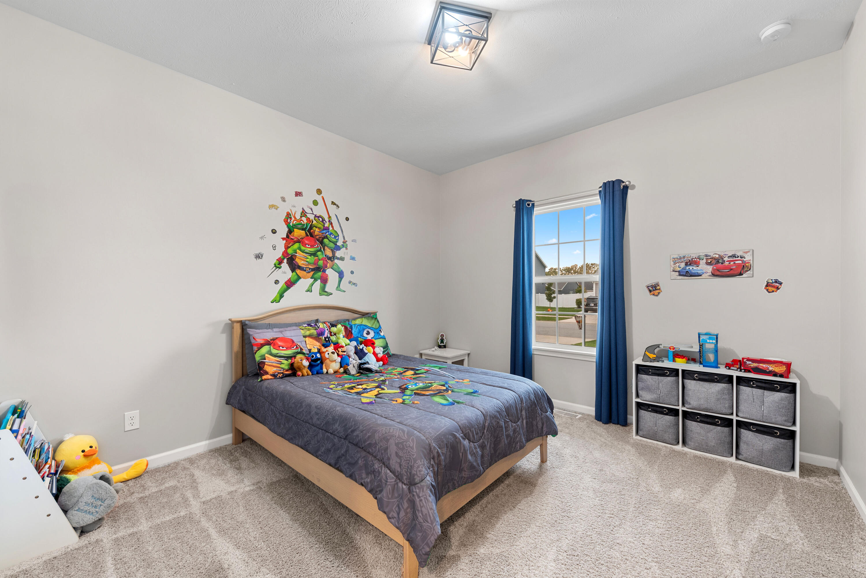 2451 Ritter Street Chesterton, IN 46304 - Photo 8 of 18 a bedroom with a bed and a dresser in it