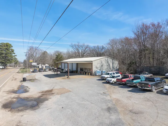 a view of a street with cars