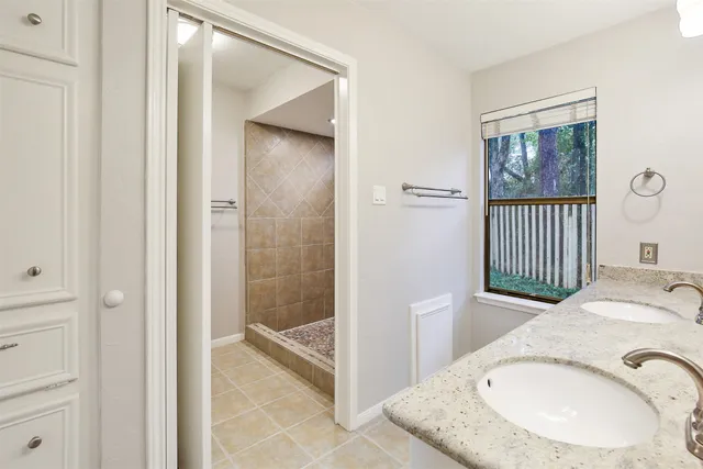 a view of a bathroom from the hallway