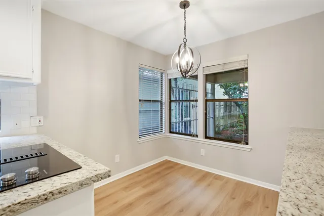 a view of a livingroom with windows
