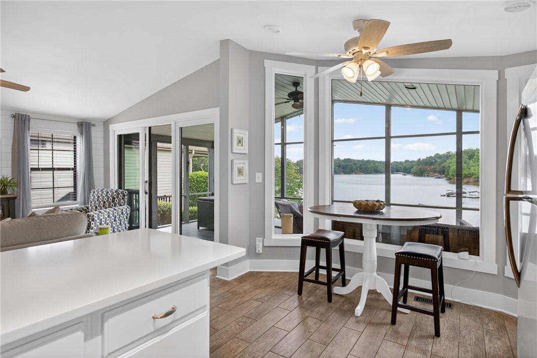 1230 Melton Road, Unit 4 West Union, SC 29696 - Photo 34 of 48 A bright kitchen with a waterfront view and elegant wood flooring.