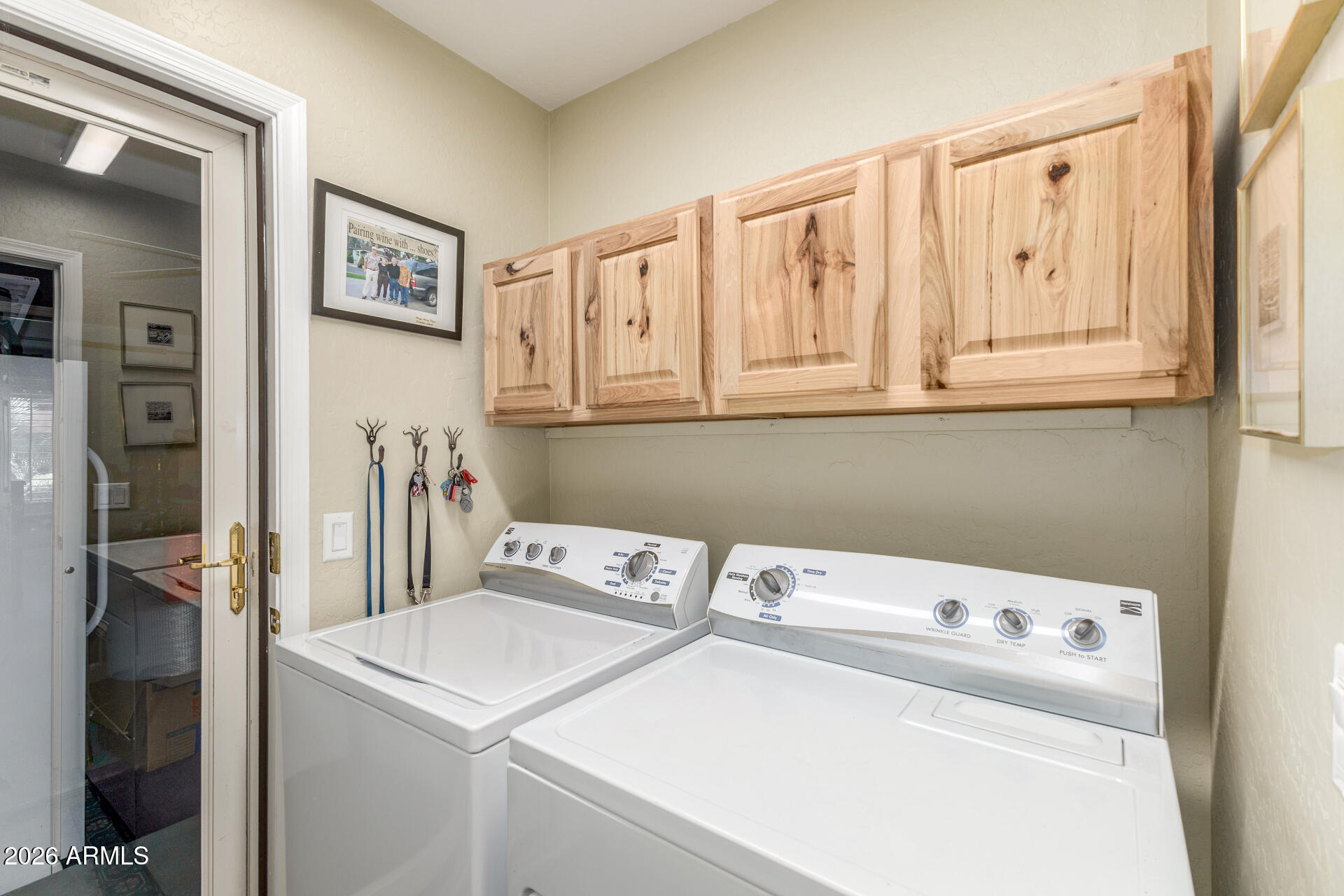11217 East Rafael Avenue Mesa, AZ 85212 - Photo 26 of 52 Laundry room cabnets