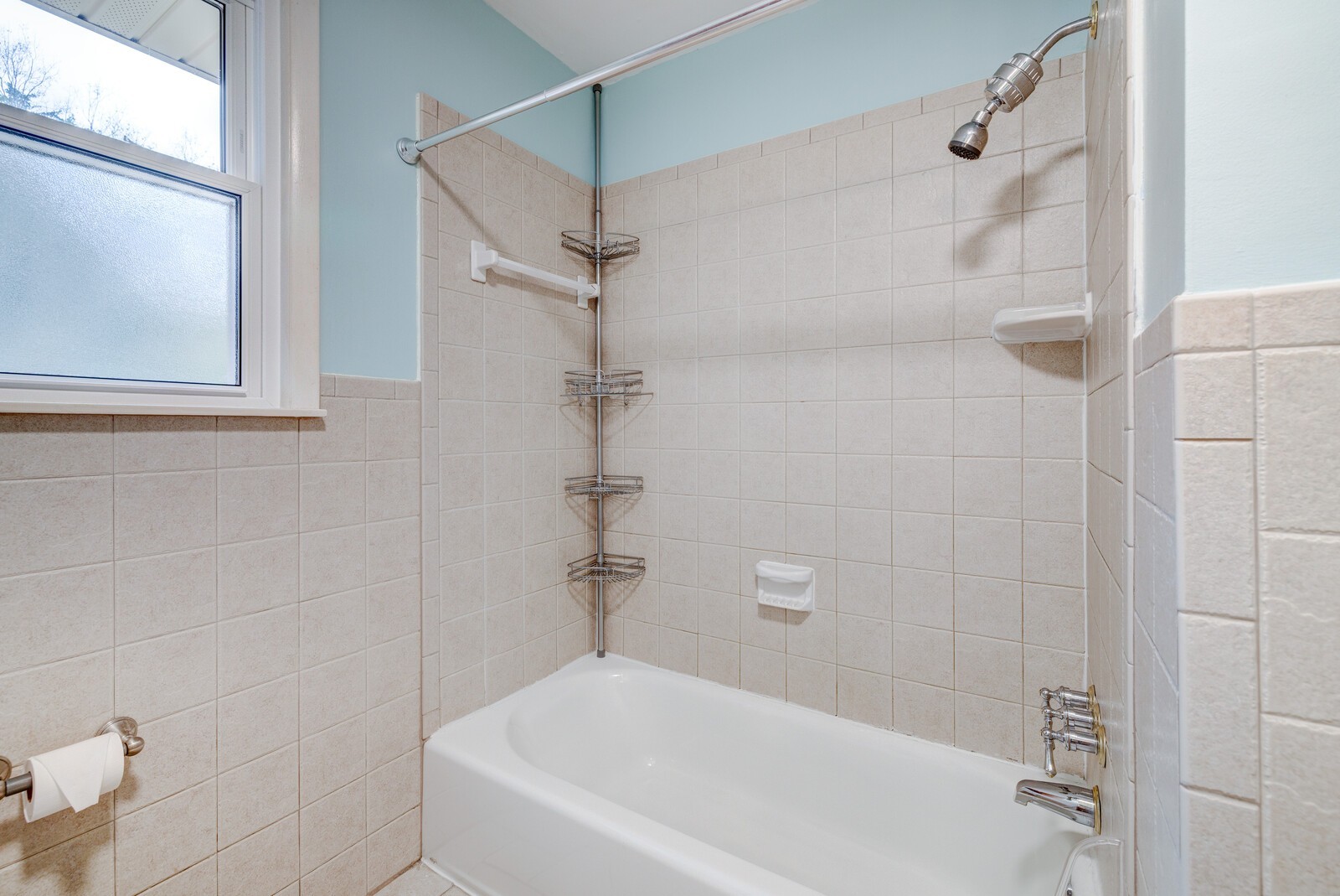 5075 Kittrell Road Nashville, TN 37221 - Photo 19 of 48 Tile floors and surround in guest bath located in hallway leading to bedrooms