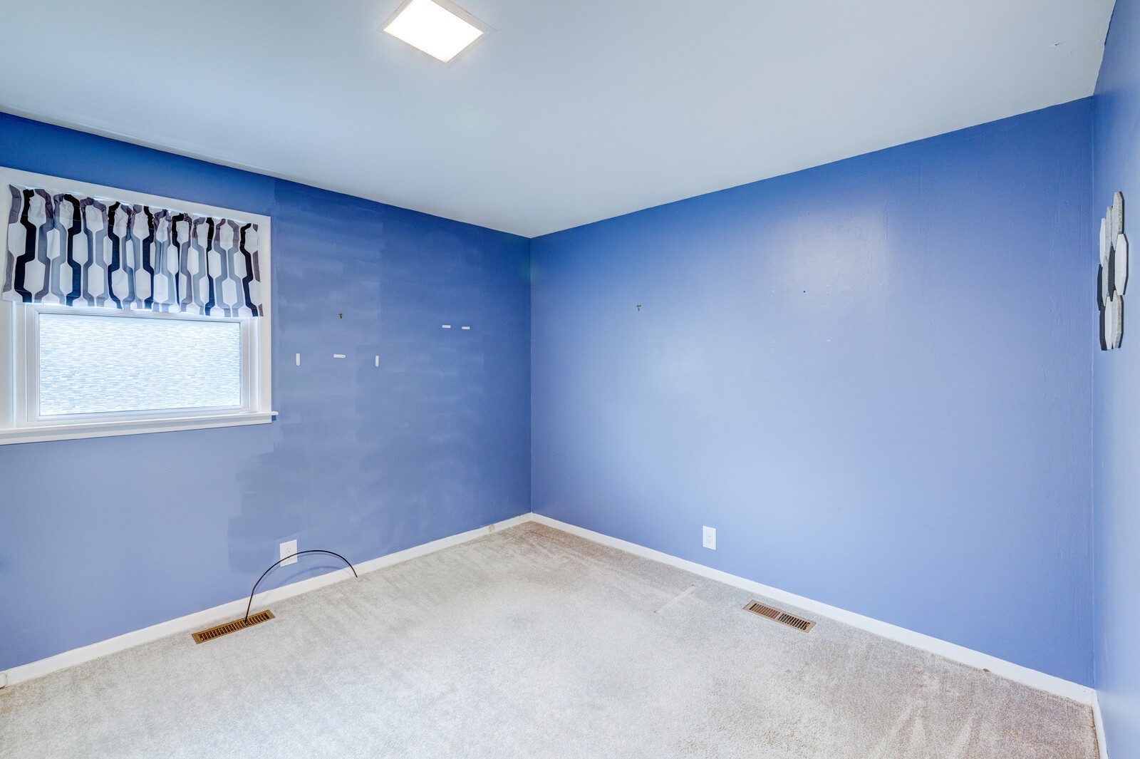 5075 Kittrell Road Nashville, TN 37221 - Photo 22 of 48 Bedroom #2 is the only room in the home with carpet.