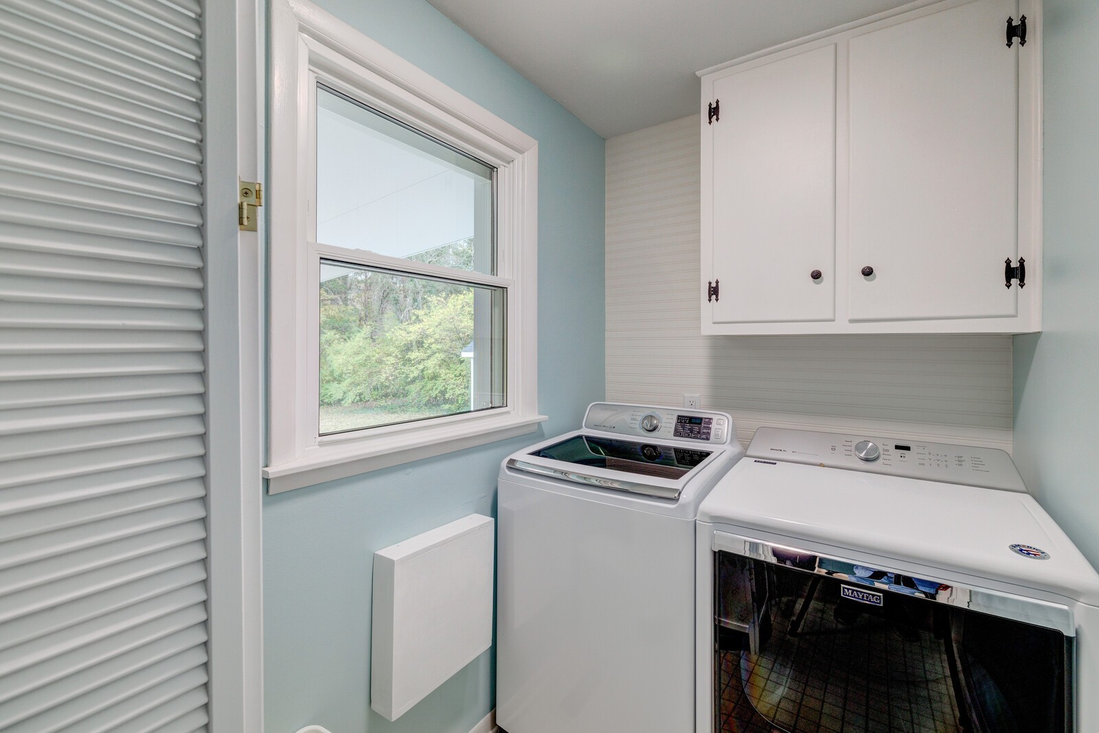 5075 Kittrell Road Nashville, TN 37221 - Photo 37 of 48 Laundry room located near kitchen, family room and back door to carport