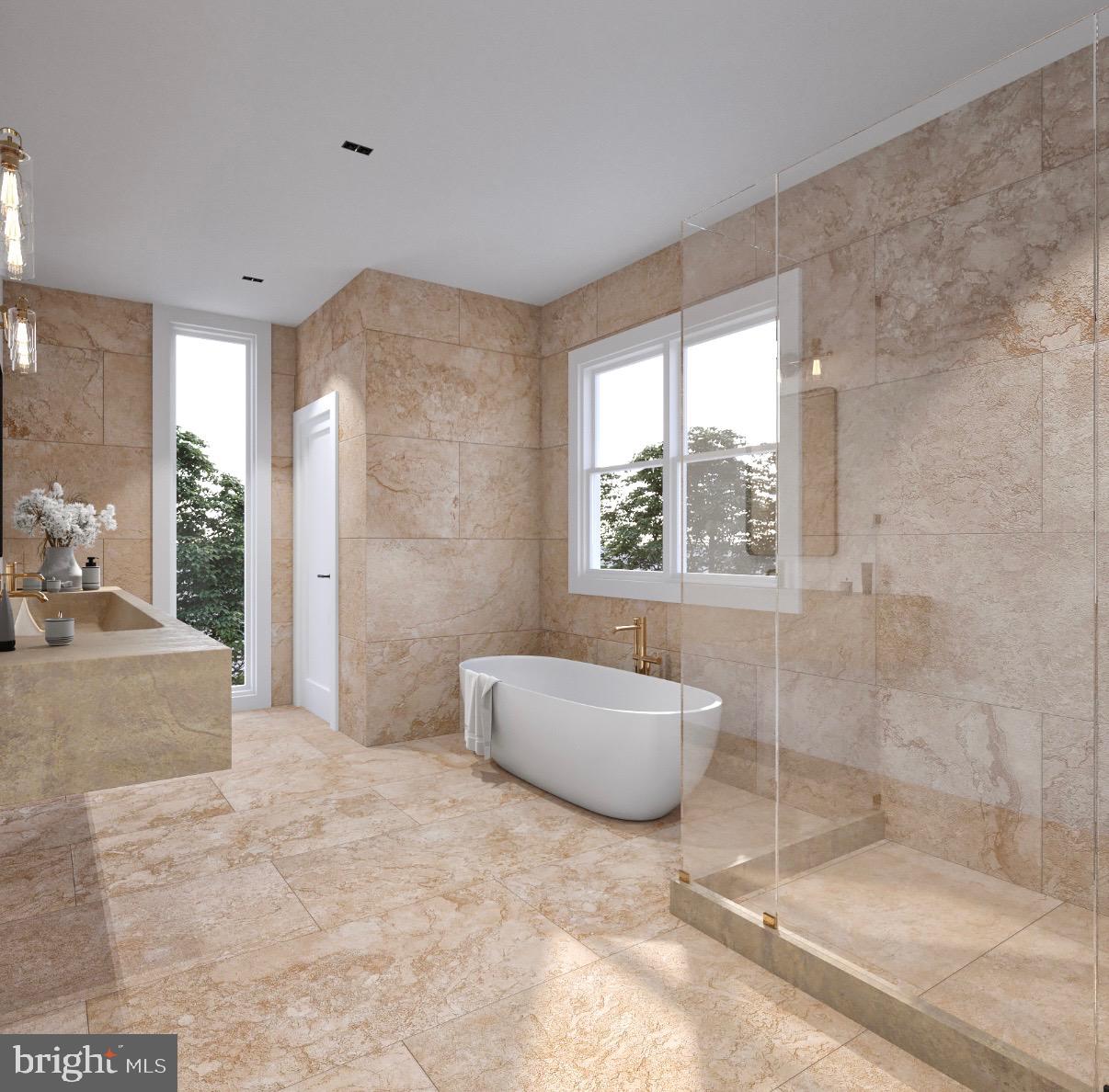 3104 Dashiell Road Falls Church, VA 22042 - Photo 7 of 9 a spacious bathroom with a bathtub and a shower