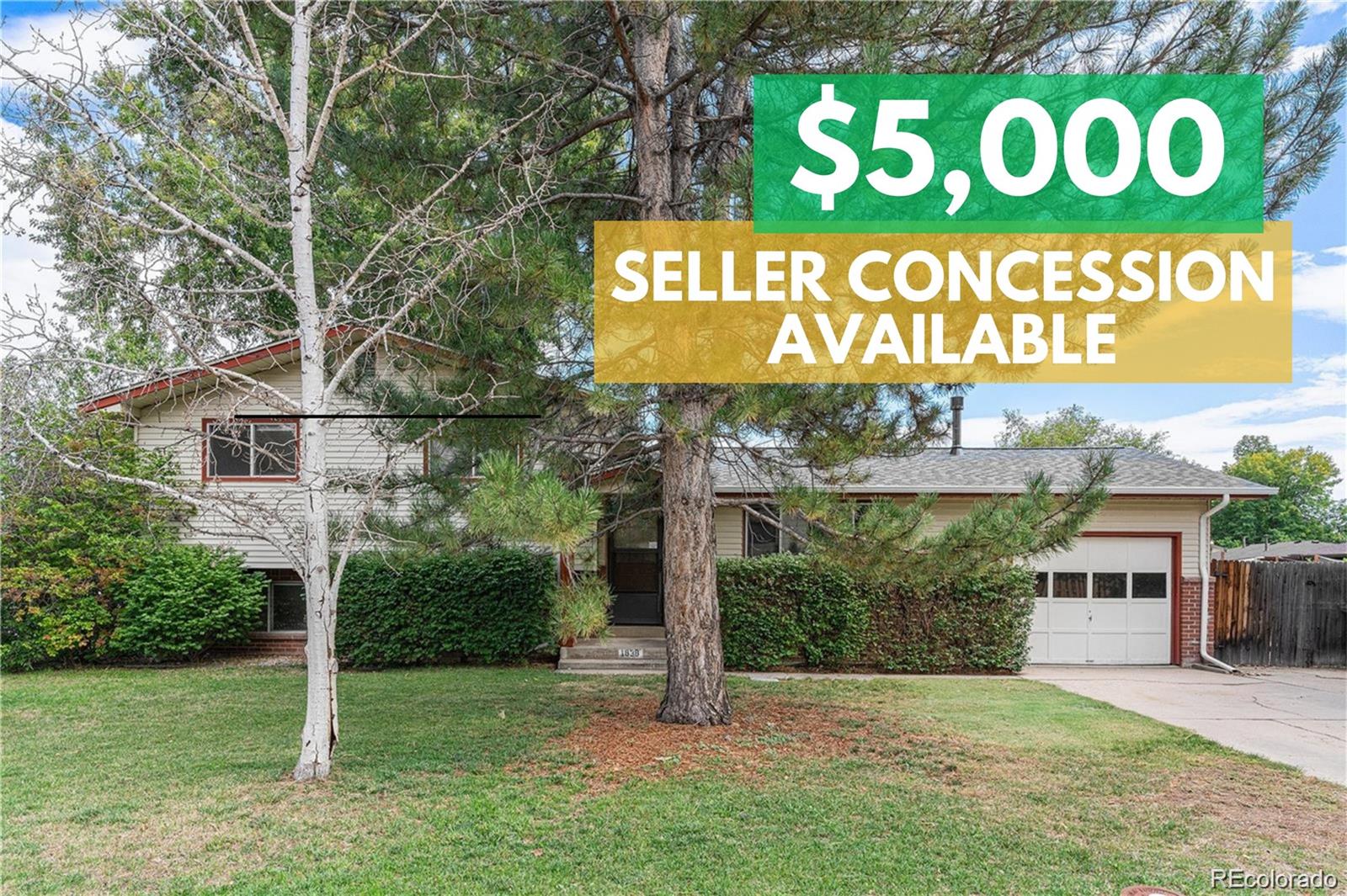 a view of outdoor space with sign board and garden