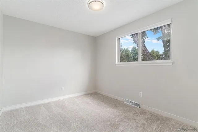 an empty room with a window