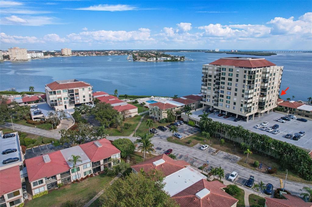 6322 Palma Del Mar Boulevard South, Unit 209 St. Petersburg, FL 33715 - Photo 2 of 42 an aerial view of a house with a lake view