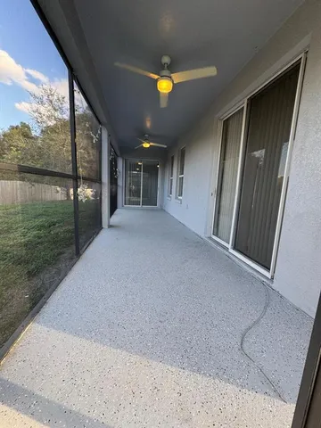 a view of swimming pool from a balcony