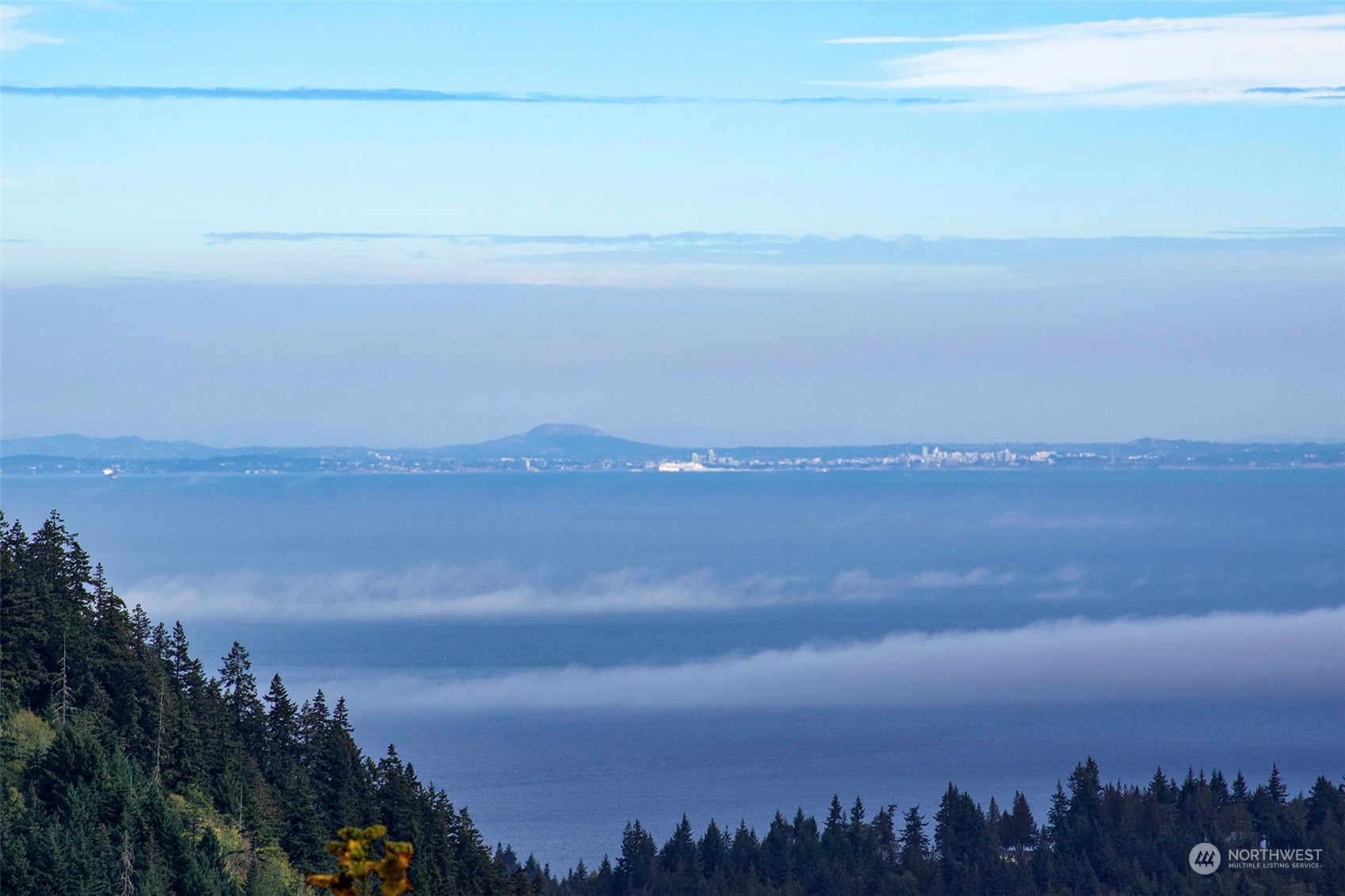 2899-2 Dan Kelly Road Port Angeles, WA 98363 - Photo 4 of 24 a view of a lake and mountain in the back