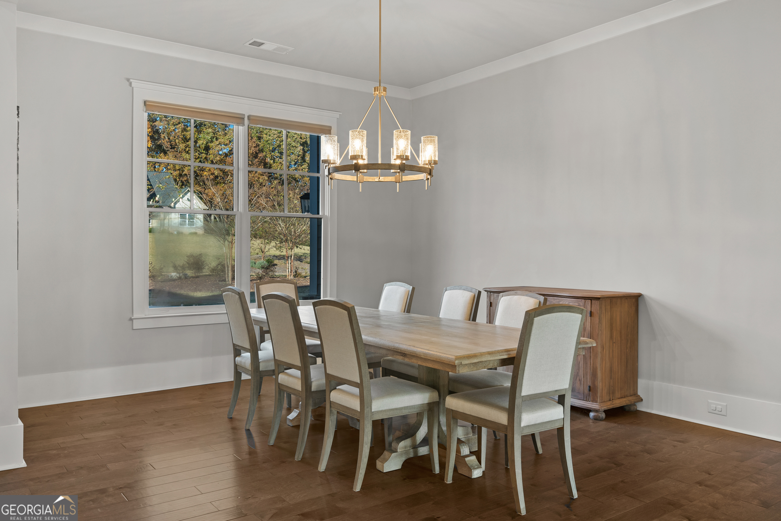 652 Meadow Run Court Clarkesville, GA 30523 - Photo 12 of 61 a view of a dining room with furniture window and wooden floor