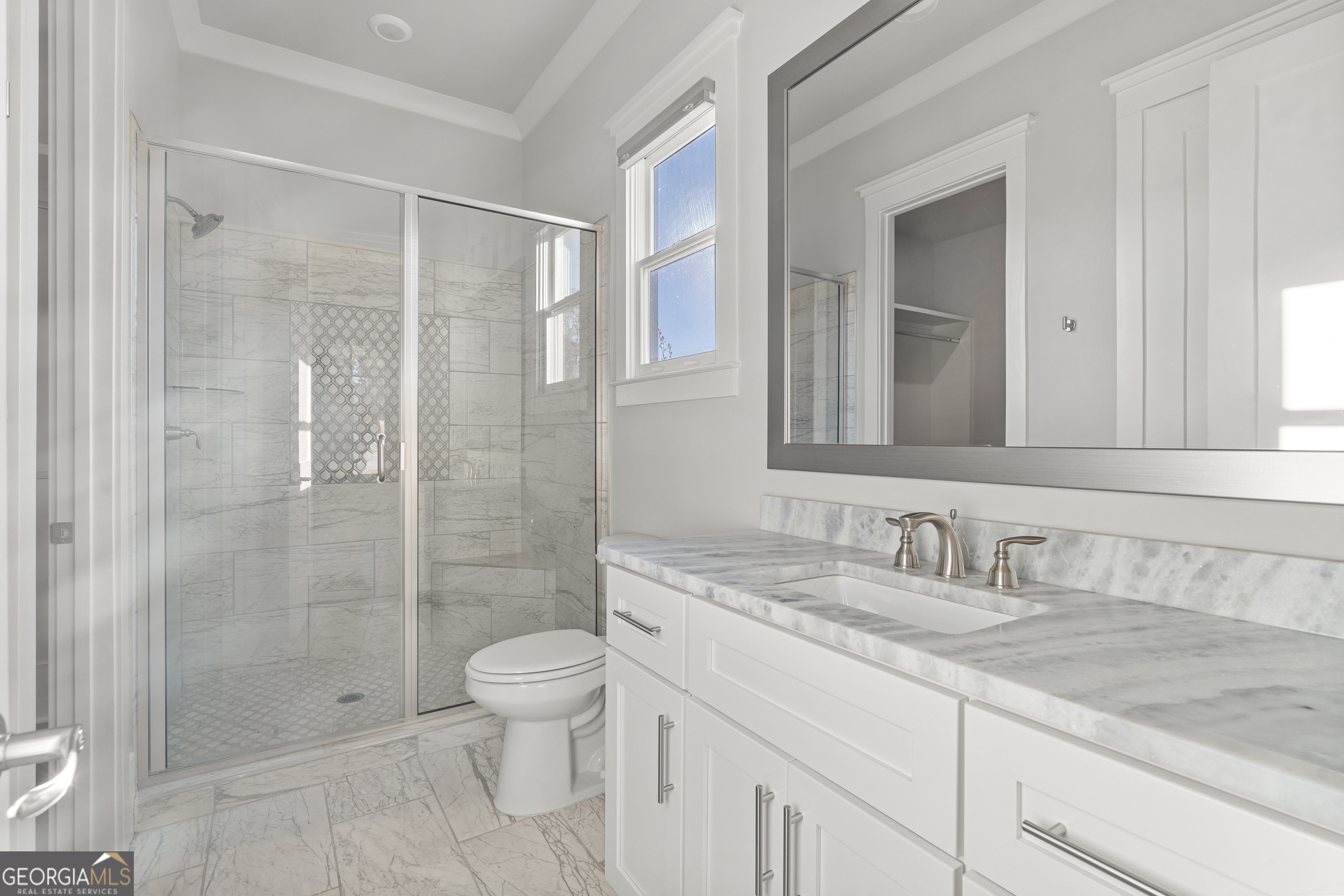 652 Meadow Run Court Clarkesville, GA 30523 - Photo 15 of 61 a bathroom with a granite countertop sink a toilet and shower