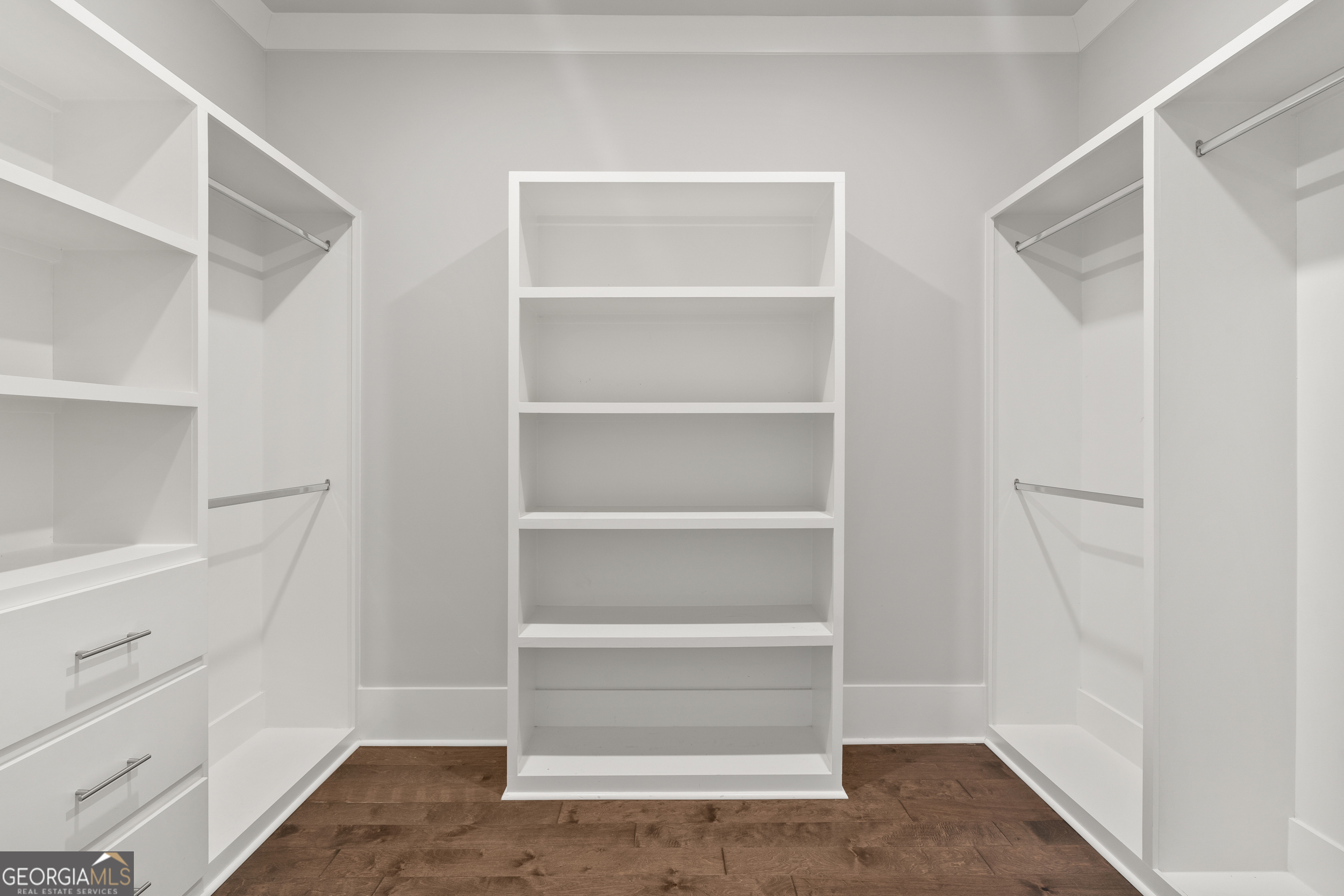 652 Meadow Run Court Clarkesville, GA 30523 - Photo 23 of 61 a view of walk in closet with empty racks