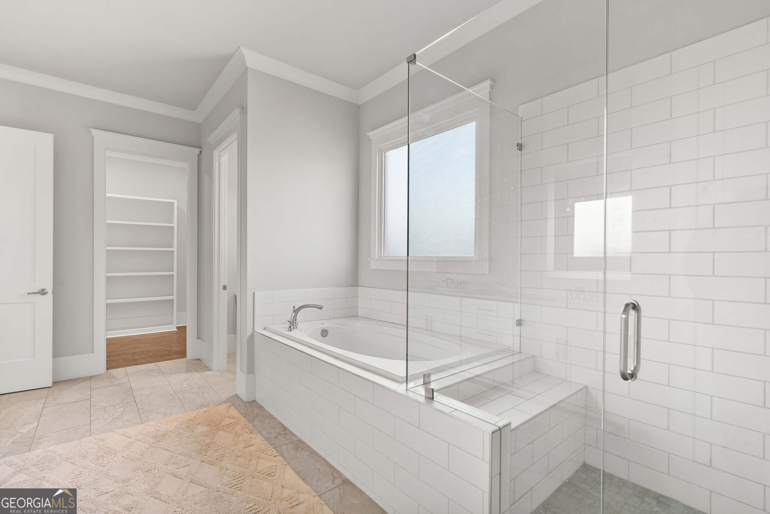 652 Meadow Run Court Clarkesville, GA 30523 - Photo 24 of 61 a spacious bathroom with a bathtub and a shower