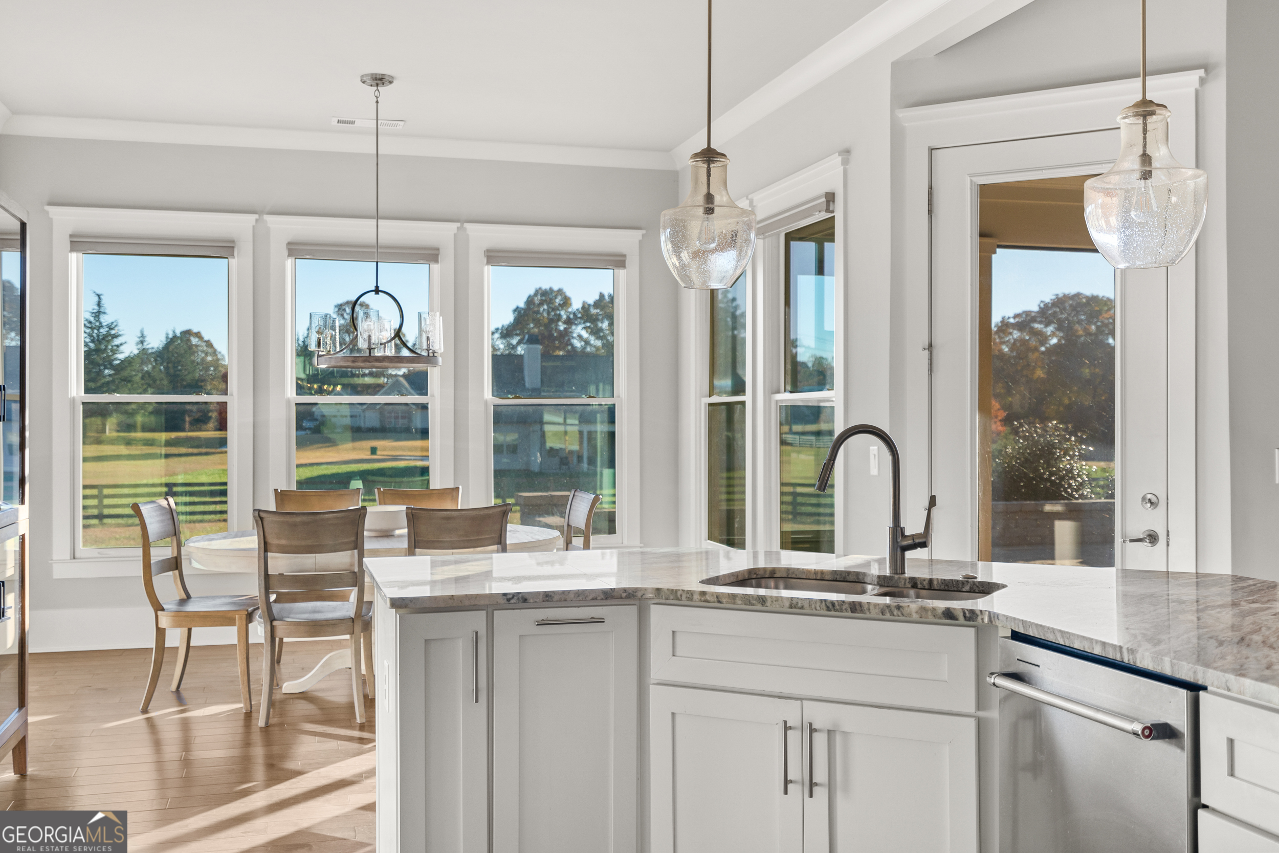 652 Meadow Run Court Clarkesville, GA 30523 - Photo 31 of 61 a kitchen with stainless steel appliances granite countertop a stove a sink and a granite counter top