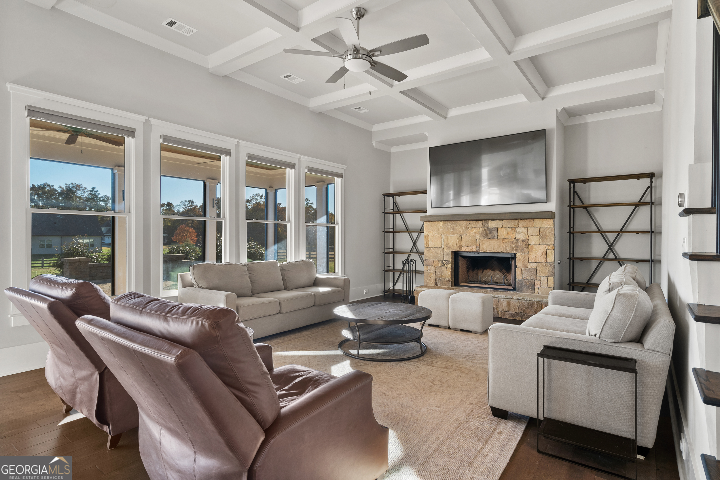 652 Meadow Run Court Clarkesville, GA 30523 - Photo 36 of 61 a living room with furniture and a fireplace