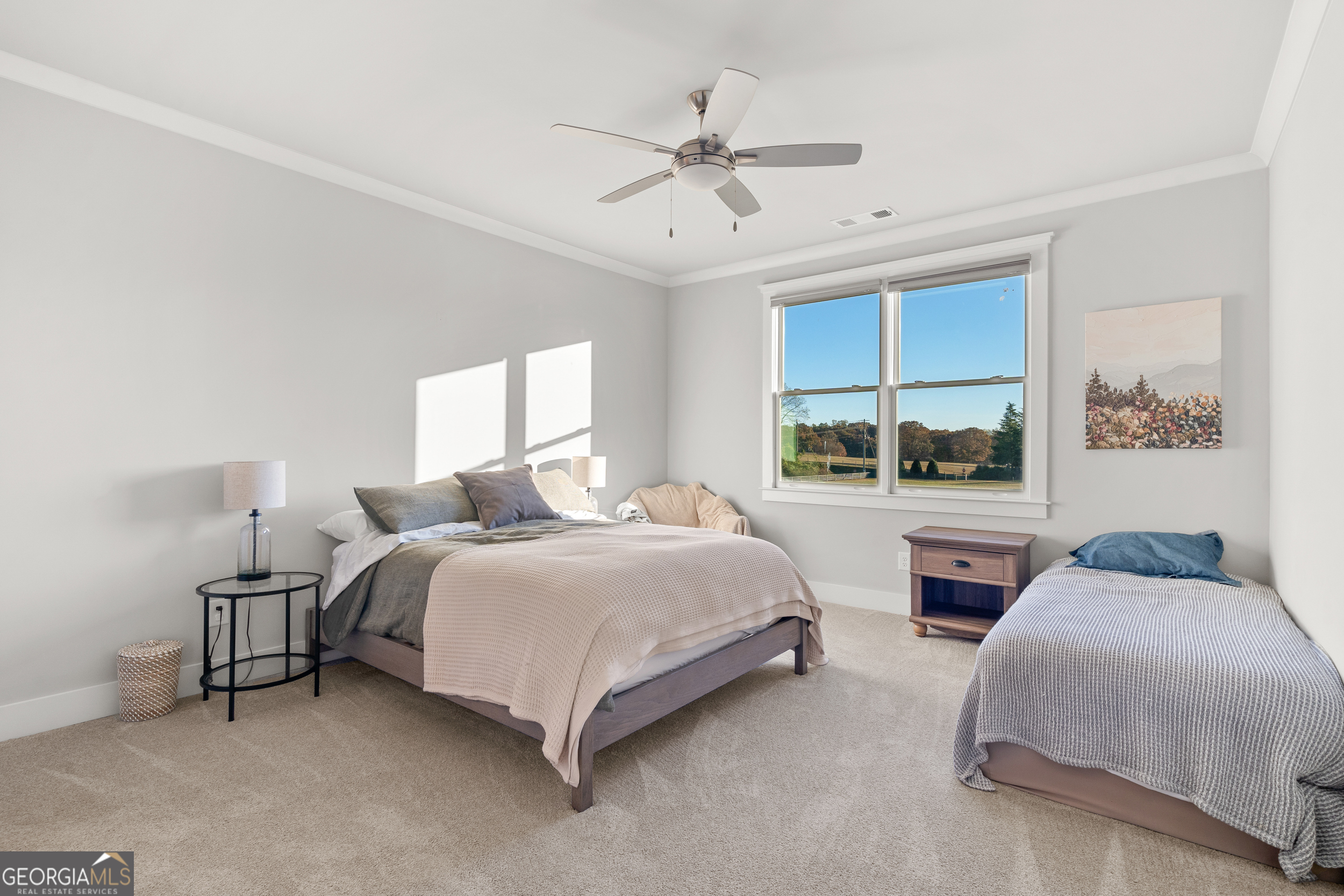 652 Meadow Run Court Clarkesville, GA 30523 - Photo 53 of 61 a bedroom with a bed and a large window