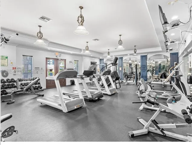 a view of a room with gym equipment
