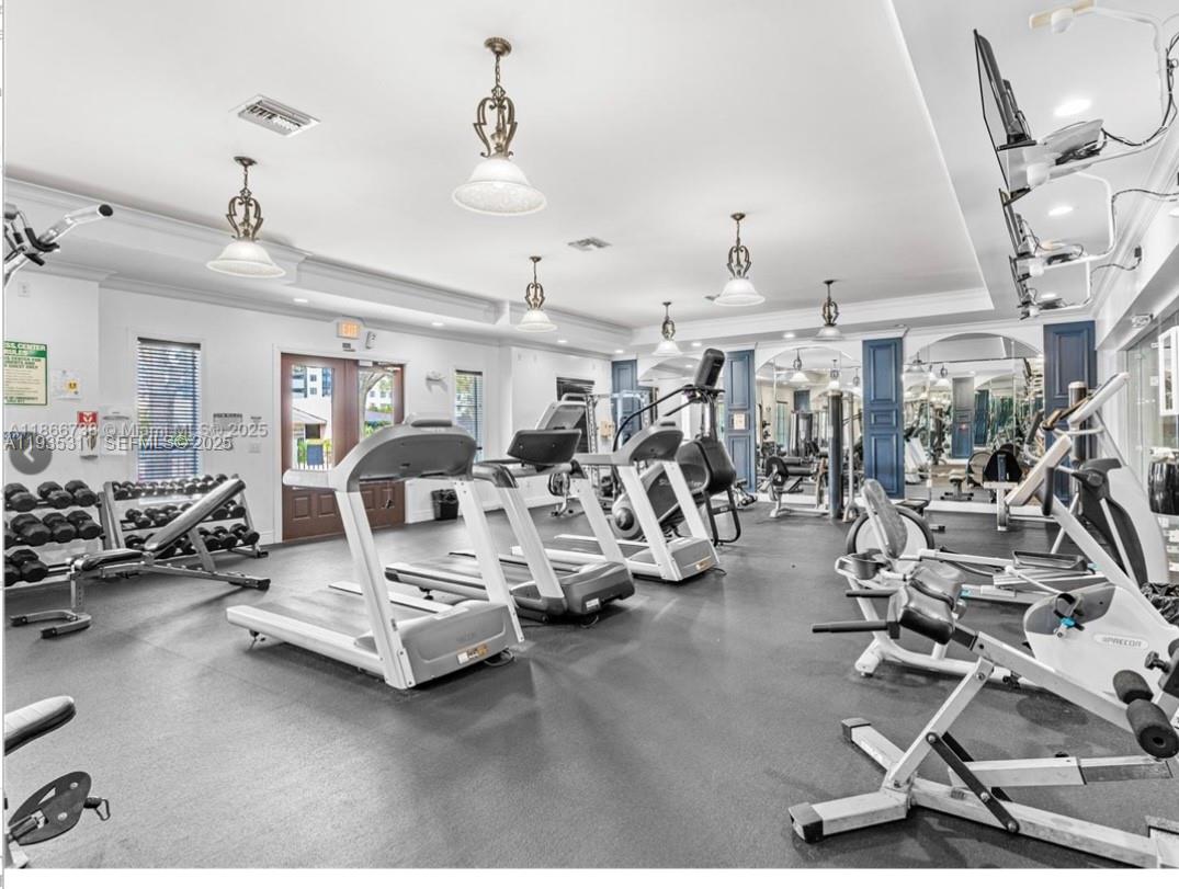 6851 Southwest 44th Street, Unit 308 Miami, FL 33155 - Photo 10 of 13 a view of a room with gym equipment