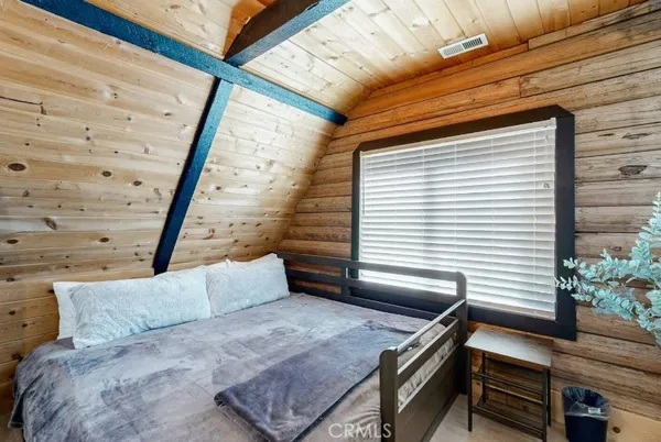 a balcony view with a seating space