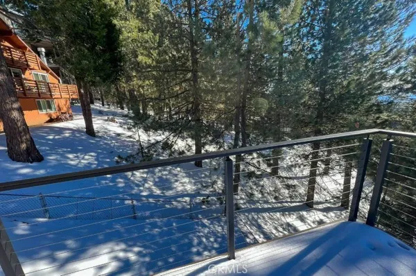 a view of street from balcony