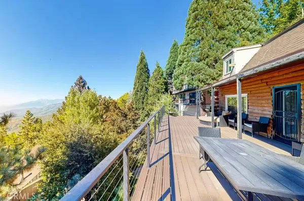 a view of a balcony with chairs