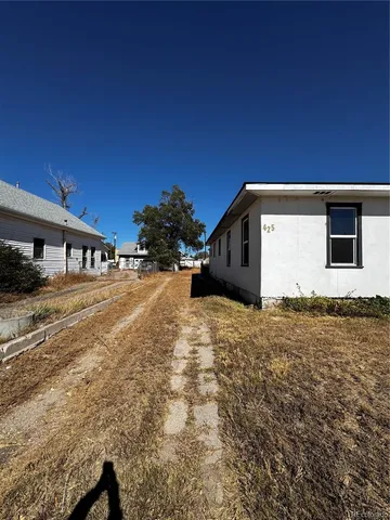 a house view with a outdoor space