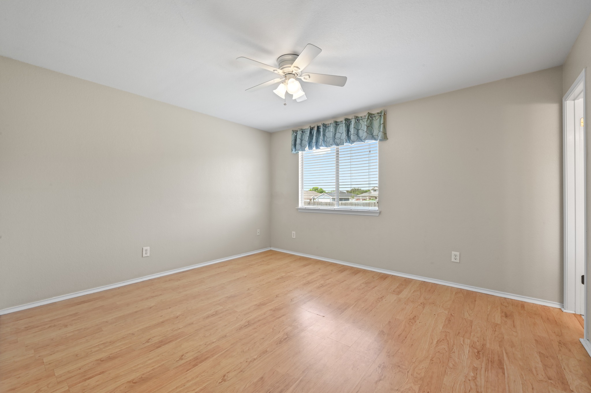 112 Mason Reed Cove Kyle, TX 78640 - Photo 13 of 26 a view of an empty room with a window