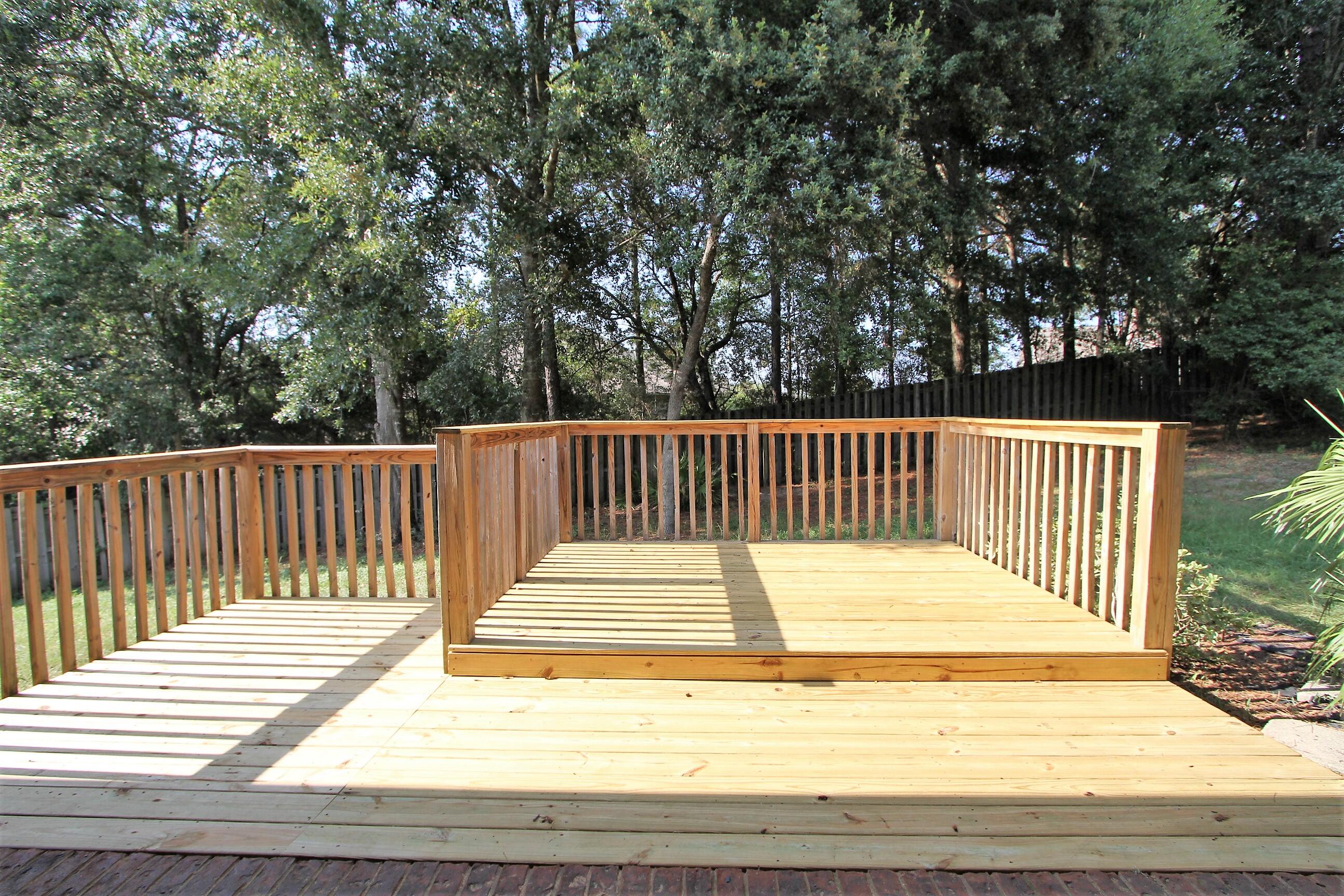 639 Red Fern Road Crestview, FL 32536 - Photo 24 of 24 a view of backyard with deck and wooden floor