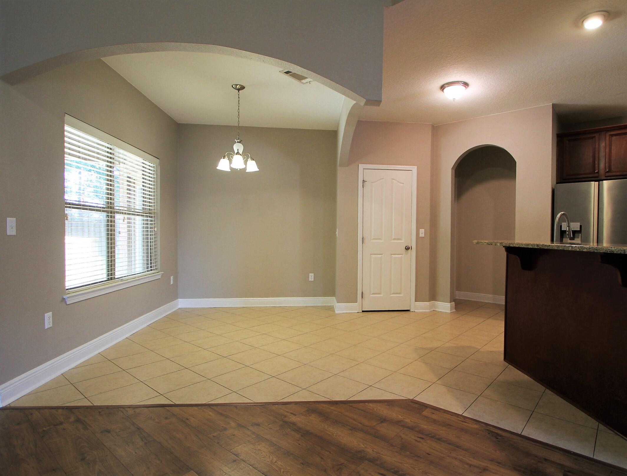 639 Red Fern Road Crestview, FL 32536 - Photo 8 of 24 a view of an empty room with a window